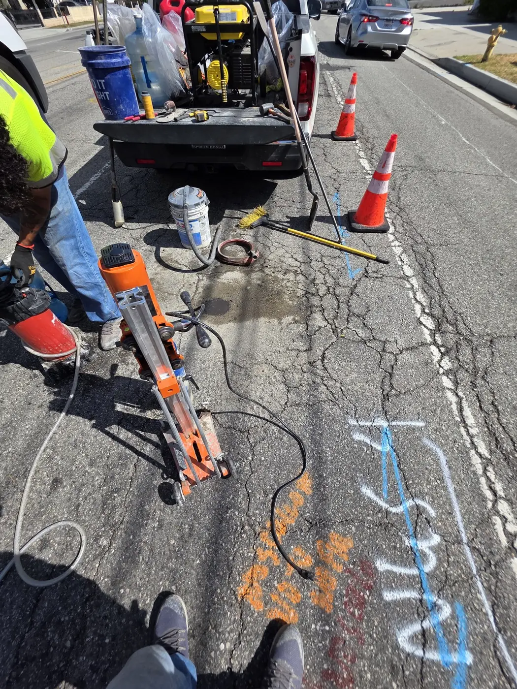 NGS portable pavement coring machine, generator, water supply and field setup at Carmenita Road in Norwalk